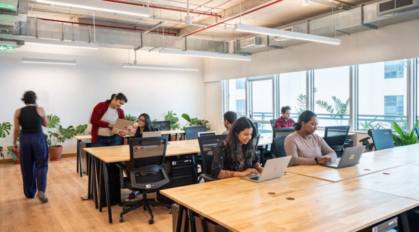 Dedicated desks in a furnished coworking office in Bangalore