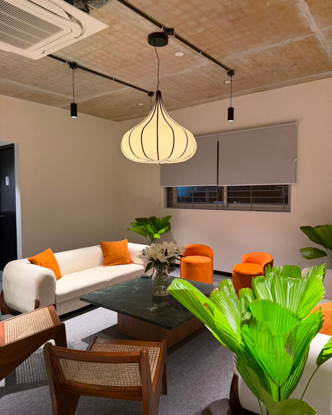 Lounge and breakout seating area in a managed office space in Hyderabad