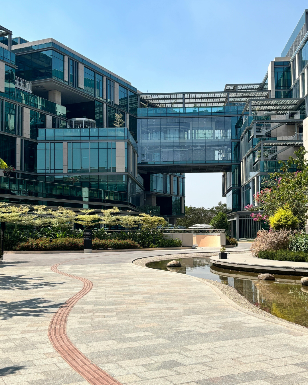 Modern Grade A office campus in Hyderabad's Financial District with landscaped courtyards and skywalks
